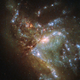 Illustration for article titled What Two Galaxies Look Like When They Merge Together As One
